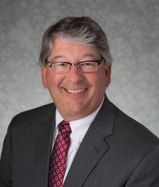 Tom Butcher honored for nearly 40 years of service to university law